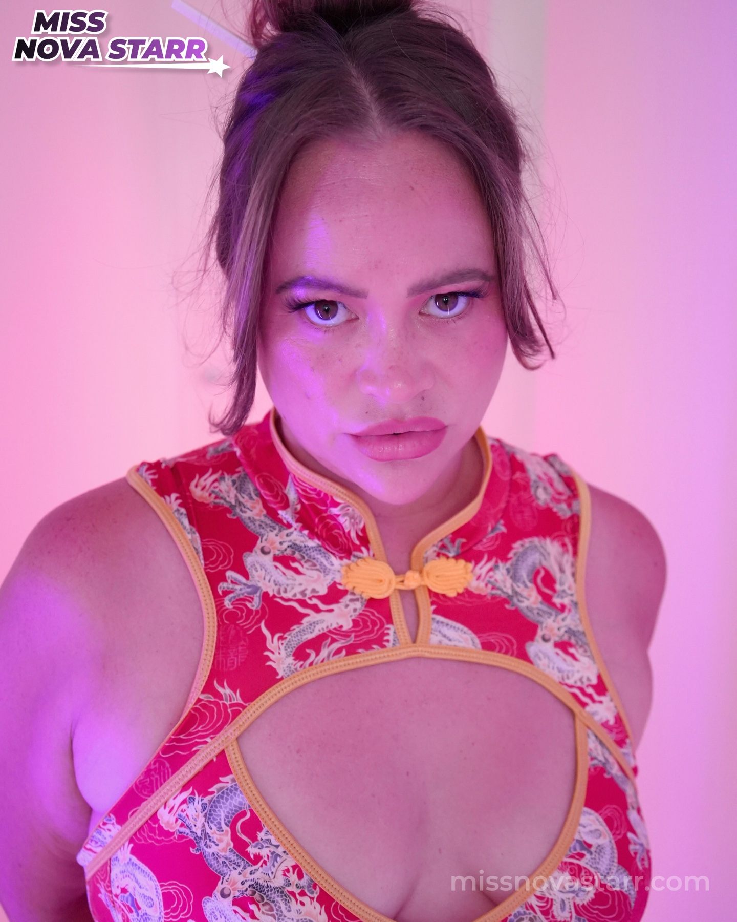 Close portrait of Miss Nova Starr in purple light
